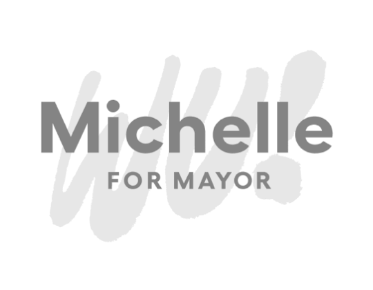 Simple dark gray Michelle for Mayor logo with a light gray WU! behind the dark gray lettering.